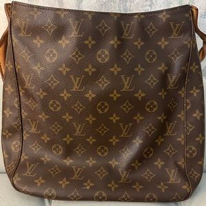Louis Vuitton zipper letter tote. Approximately 12” x 12”. Dust bag included.
